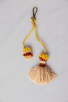 Flatlay of Tassel Pom Pom Keychain in Maize