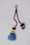 Flatlay of Tassel Pom Pom Keychain in Thunder