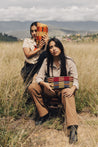 Two Women posing with Weekender Cosmetic Pouches